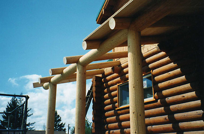 Porch made with 10" logs with 8" notched rafters